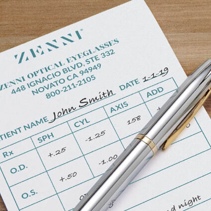 Zenni Optical Eyeglasses prescription for John Smith; includes Rx details; silver pen on top.