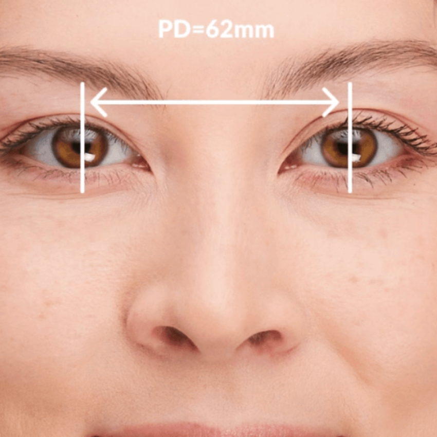 PD=62mm measured on a person's face, distance between the centers of the pupils of their eyes.